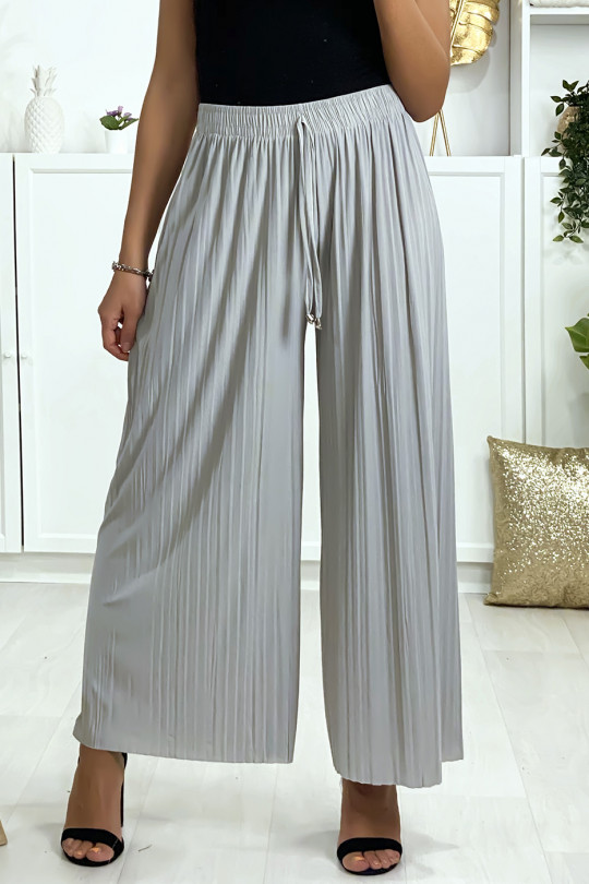 Pantalon palazzo plissé en gris. Mode femme - 2