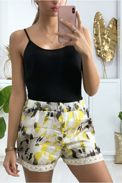 Short doublé avec des touches dorées, dentelle et strass - 1