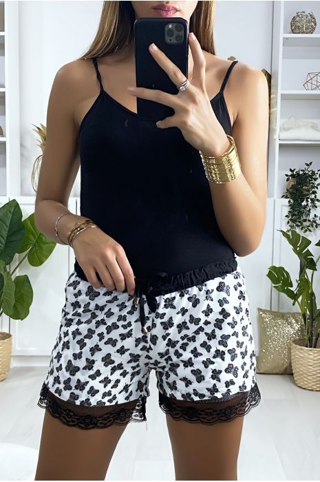 Short blanc motif papillon doublé avec dentelle
