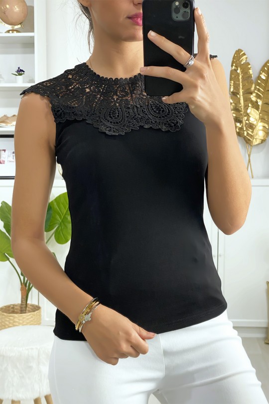 Black sleeveless top with embroidery on the bust - 1