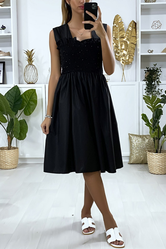Uitlopende zwarte jurk met parels en elastiek bij de buste - 1