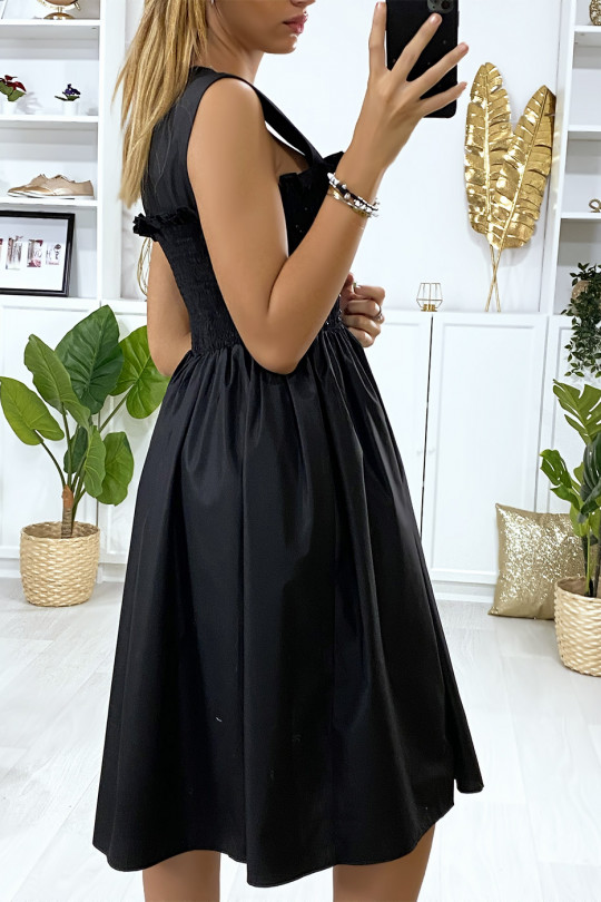 Flared black dress with pearls and elastic at the bust - 5
