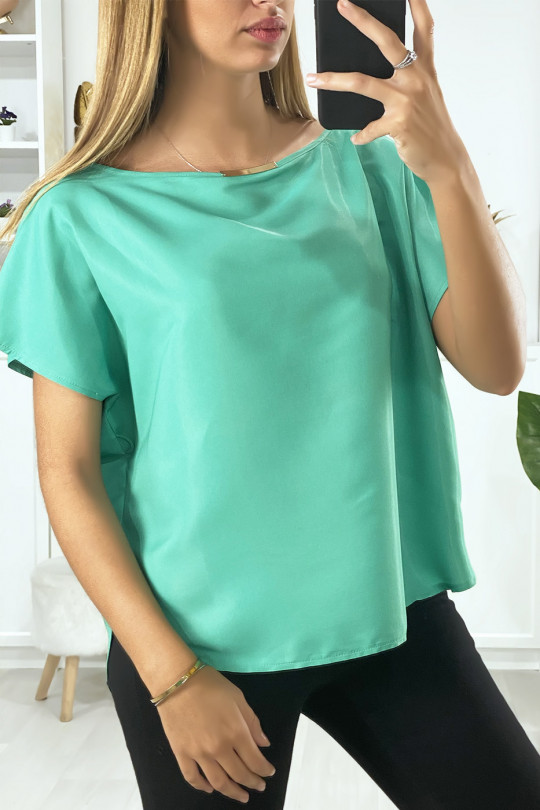 Green batwing blouse with gold accessory at the collar - 2