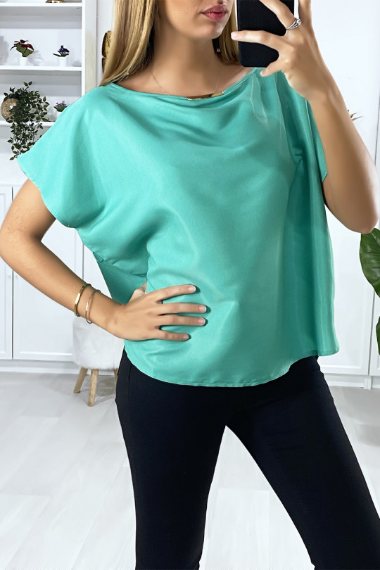 Green batwing blouse with gold accessory at the collar - 3