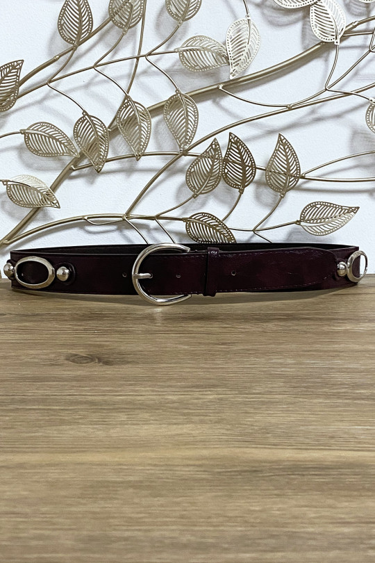 Black faux leather belt with circle accessories at the waist - 1