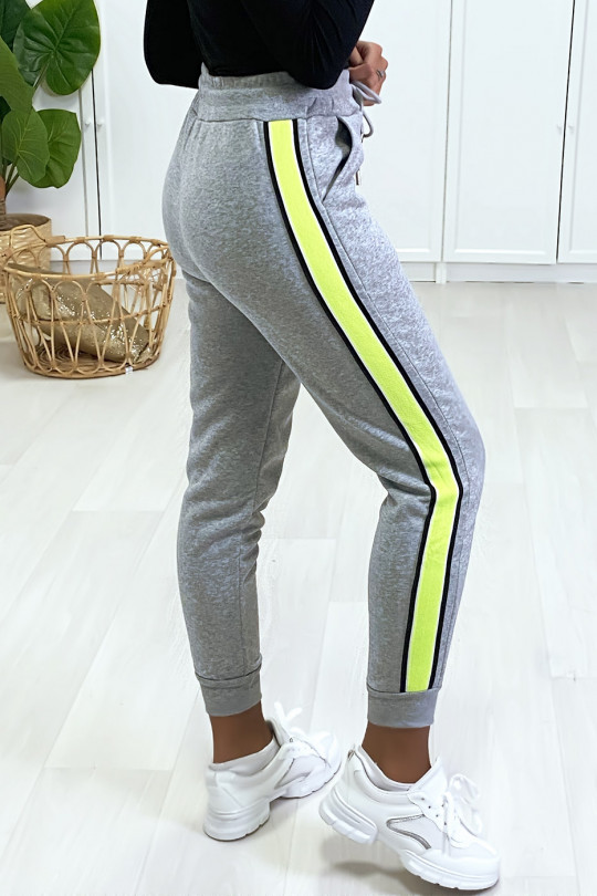 Gray jogging with fluorescent yellow stripe on the side. - 5
